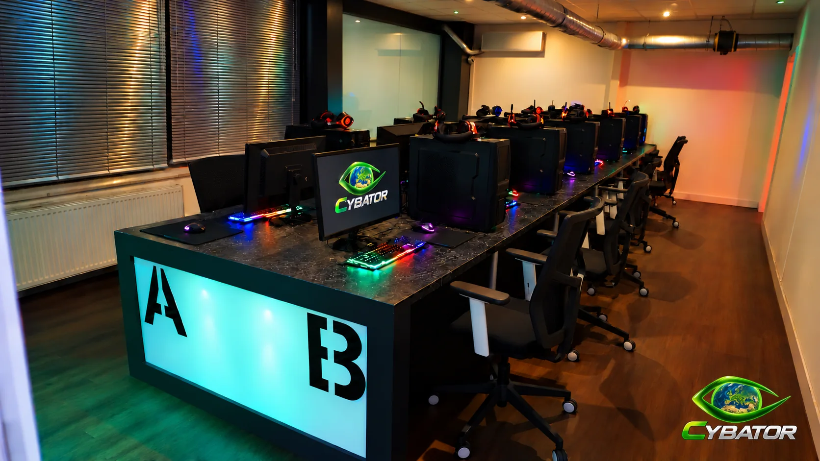 PC gaming room with illuminated stations – Cybator